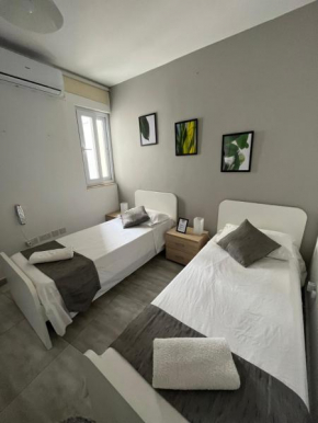F3 Room 2, Private Room two single beds shared bathroom